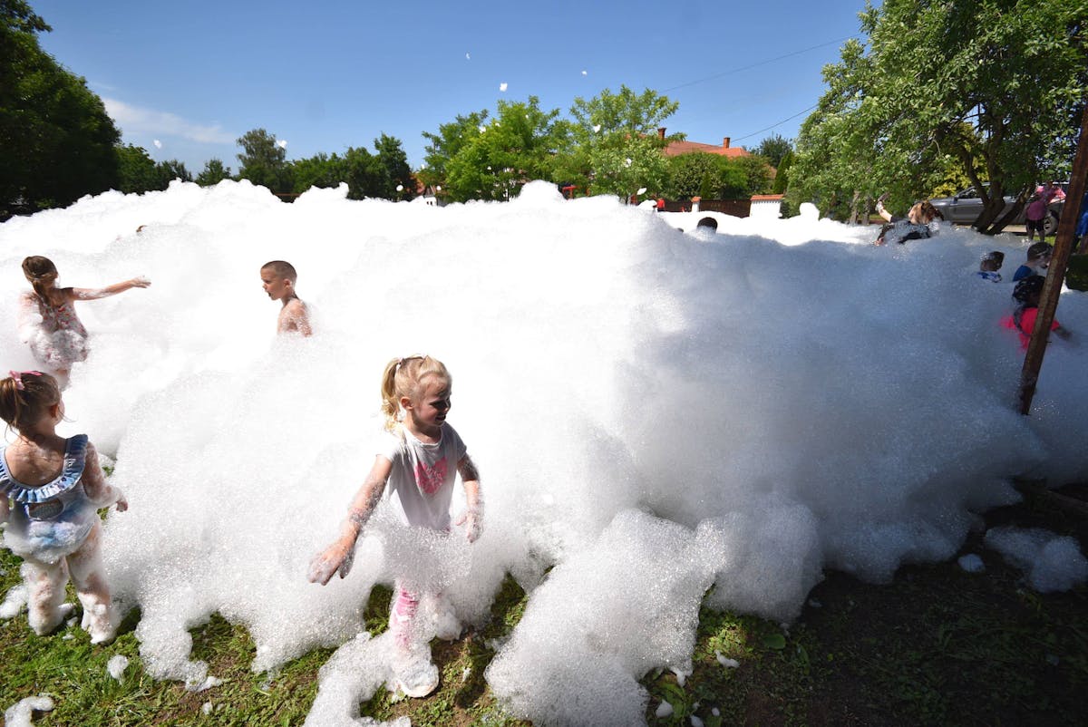 Kids enjoying a foam party