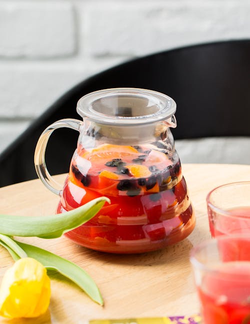 Free Fruit Juice in Clear Glass Pitcher Stock Photo