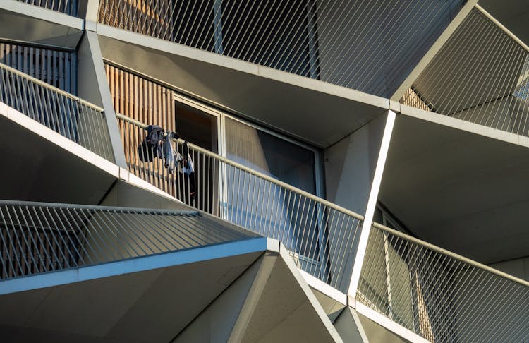 Steel Futuristic Geometric Balconies On Modern Apartment Building