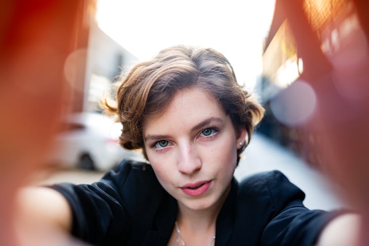 Close-Up Photo Of Woman With Short Hair