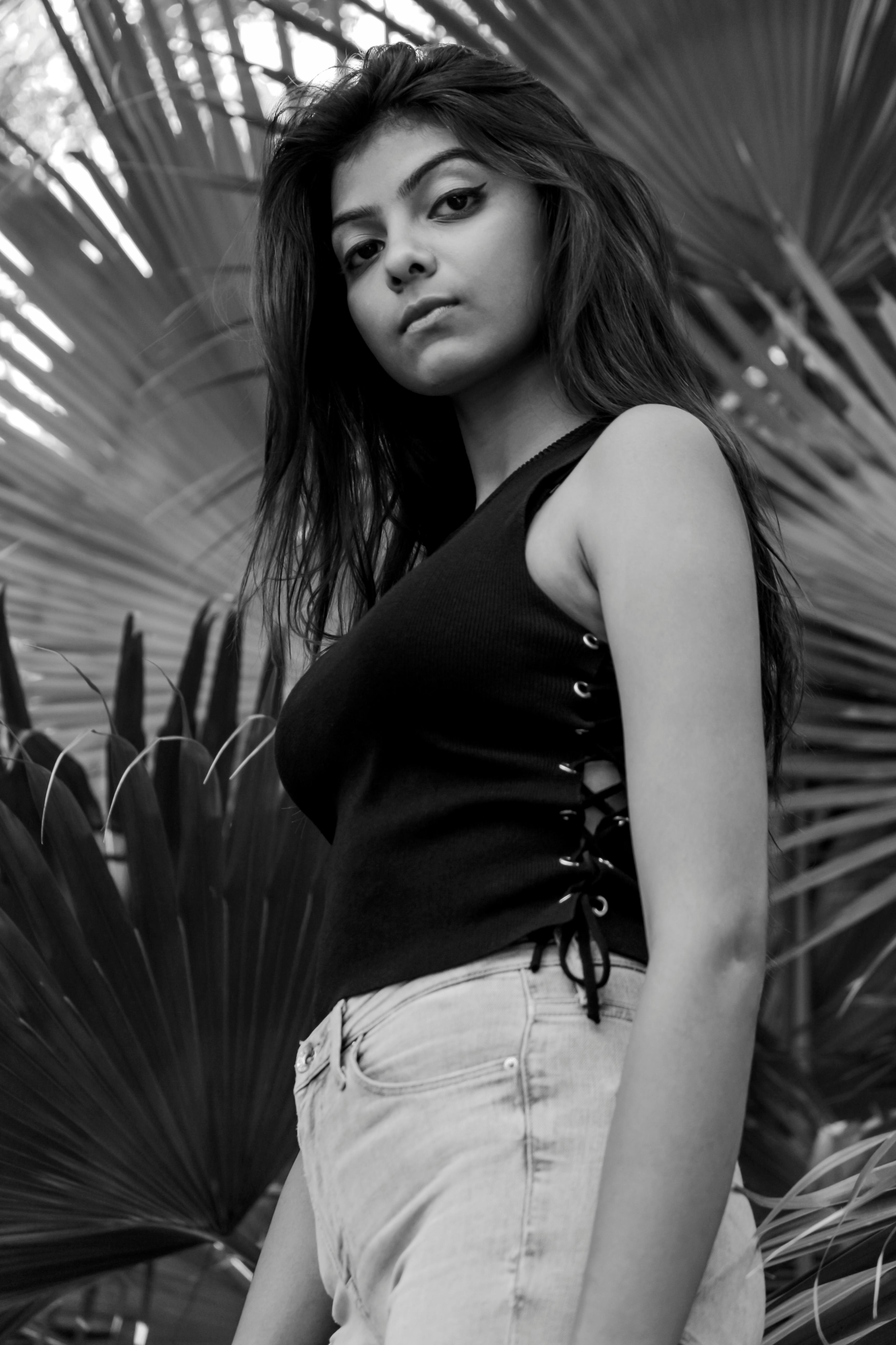 standing woman wearing crop top