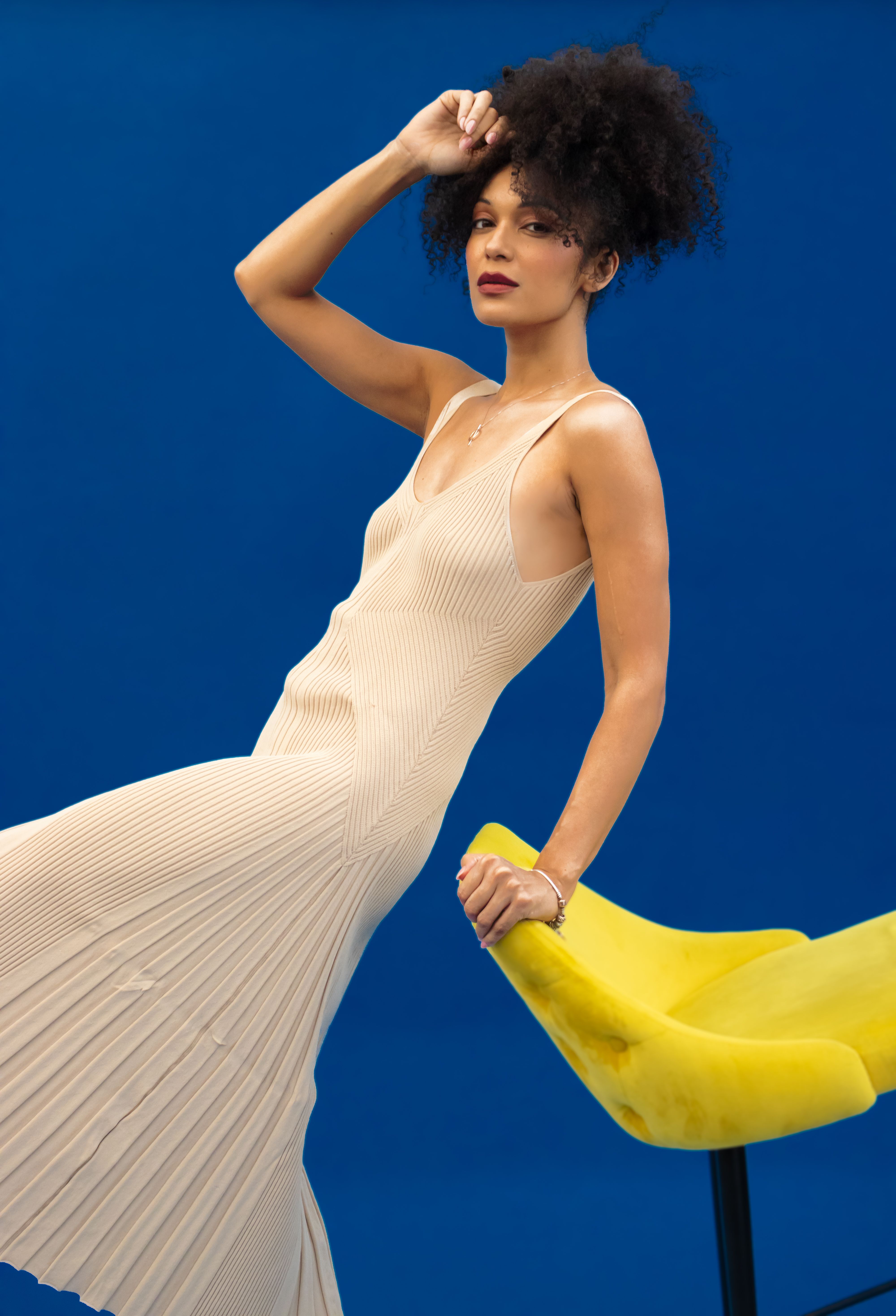 A Woman Posing in a Dress · Free Stock Photo