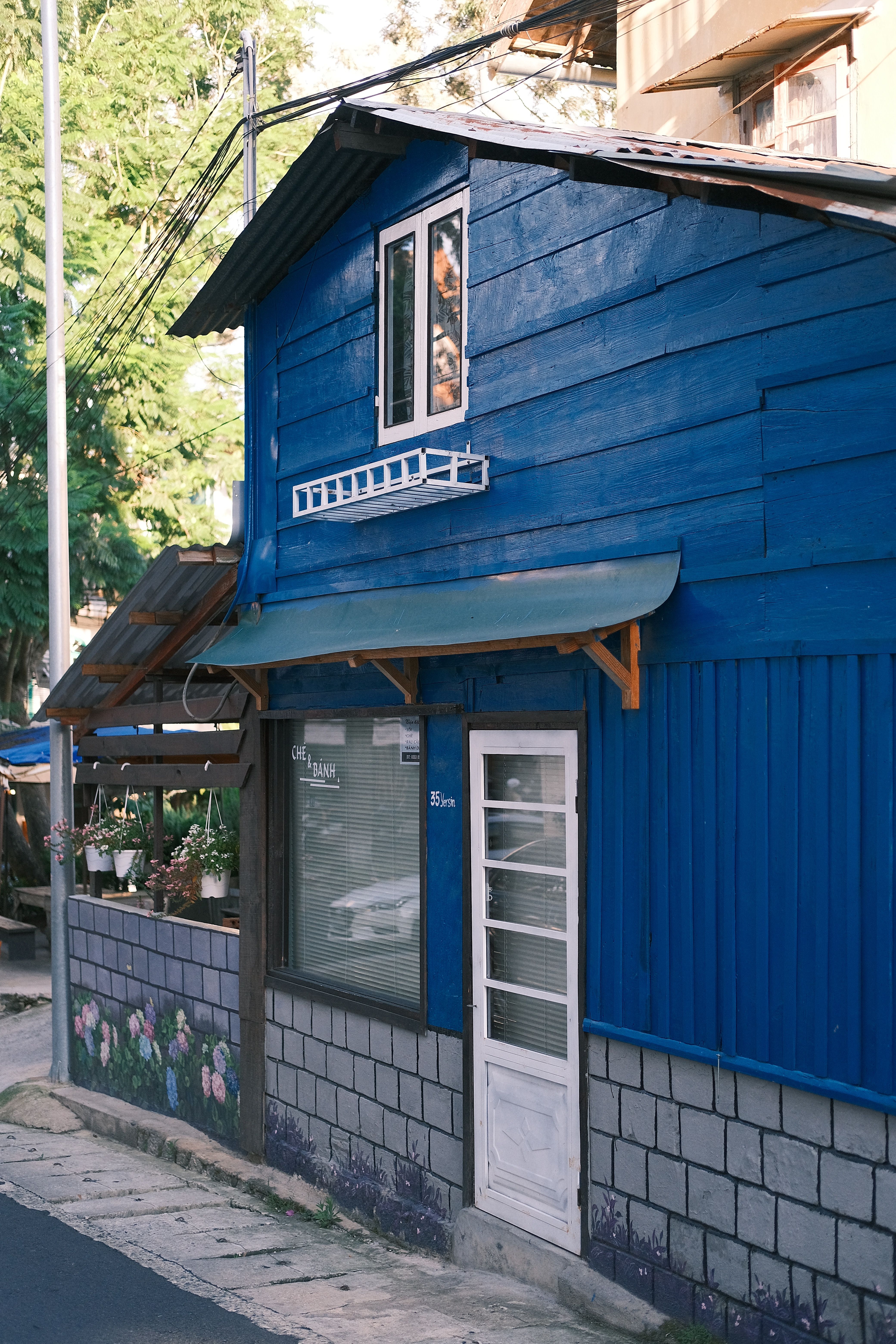 Blue Wooden House with White Door · Free Stock Photo