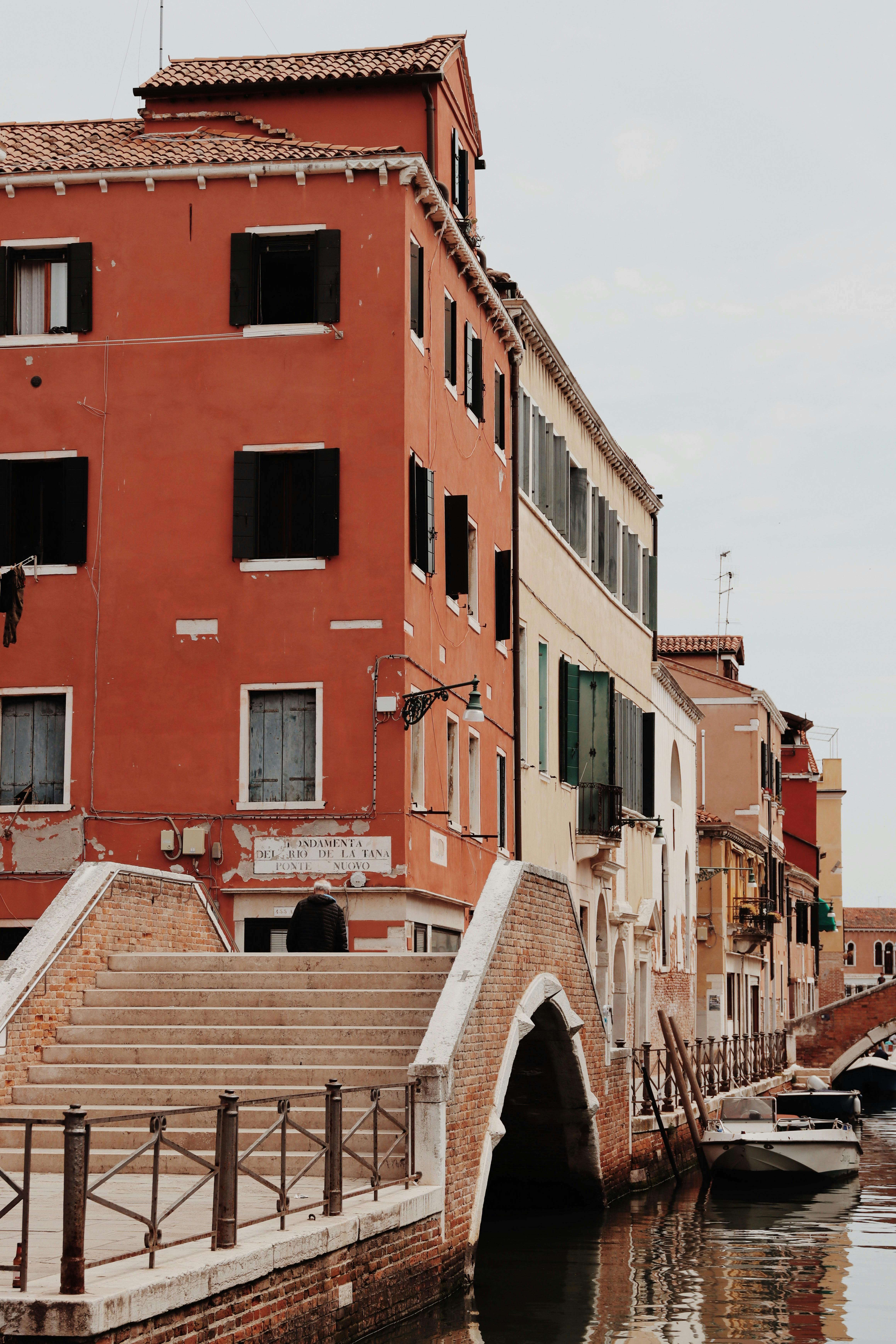 Discover the picturesque architecture of Venice with its iconic canals and colorful buildings.