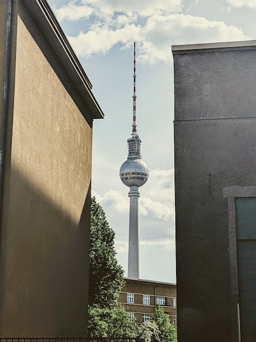 Photo Of Tower Between Two Buildings