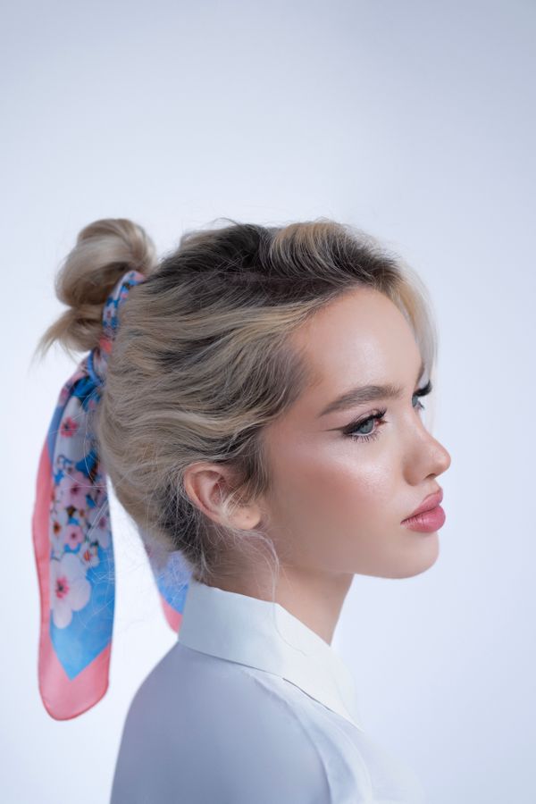 Scarf-wrapped bun hairstyle