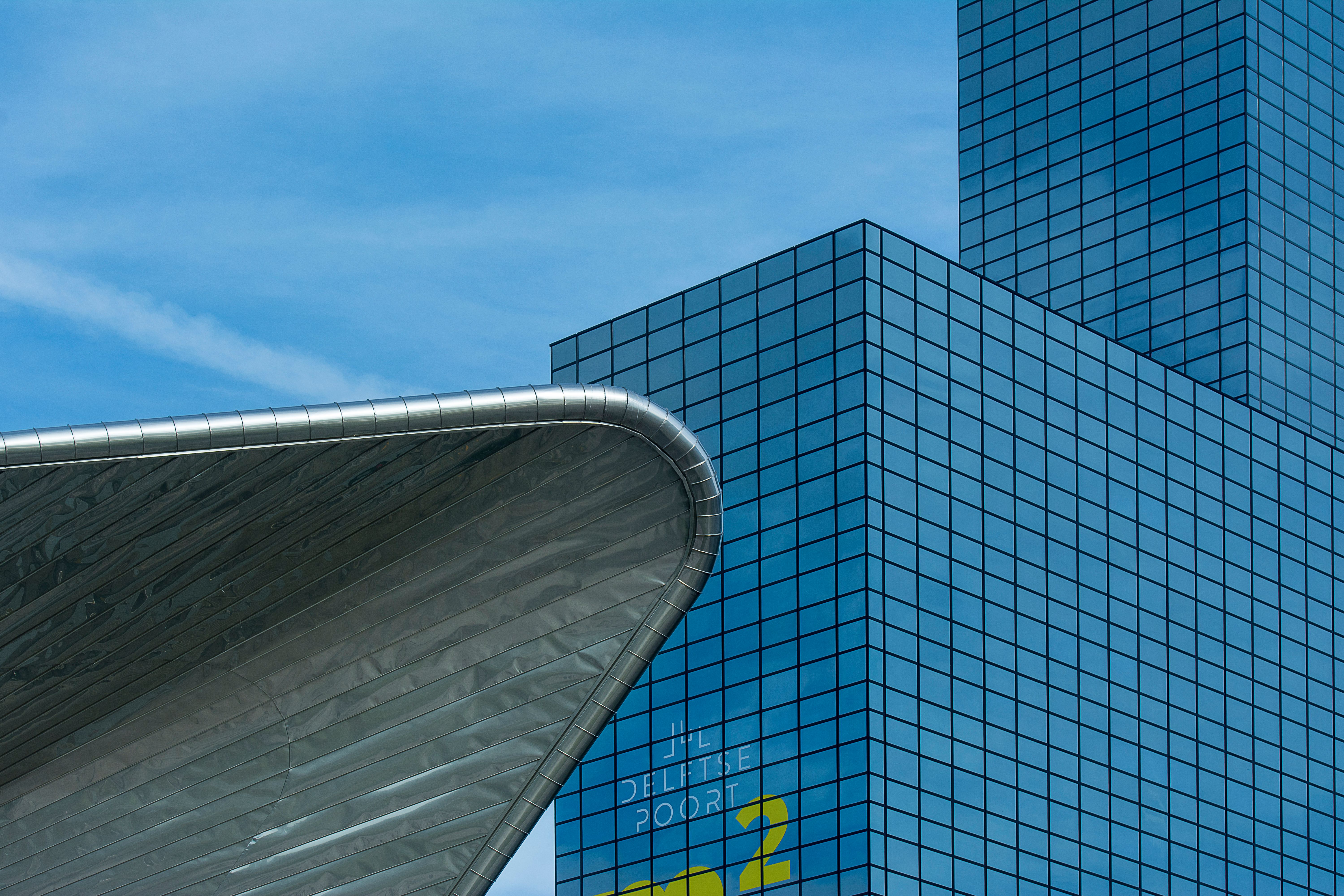 Close-up of modern architectural buildings in Rotterdam, highlighting sleek design and urban cityscape.