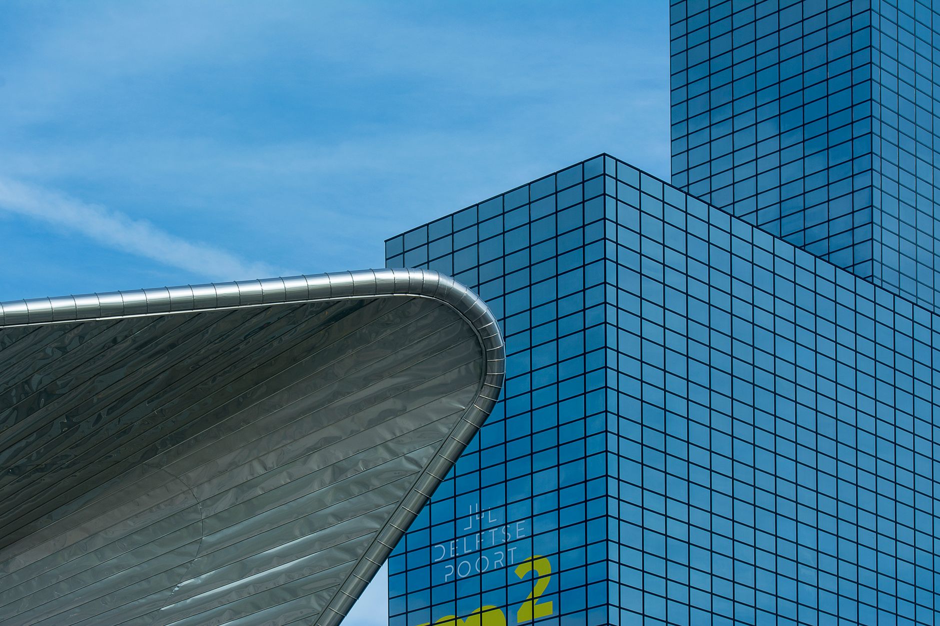 Close-up of modern architectural buildings in Rotterdam, highlighting sleek design and urban cityscape.