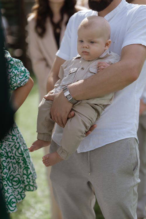 A Man Holding his Child