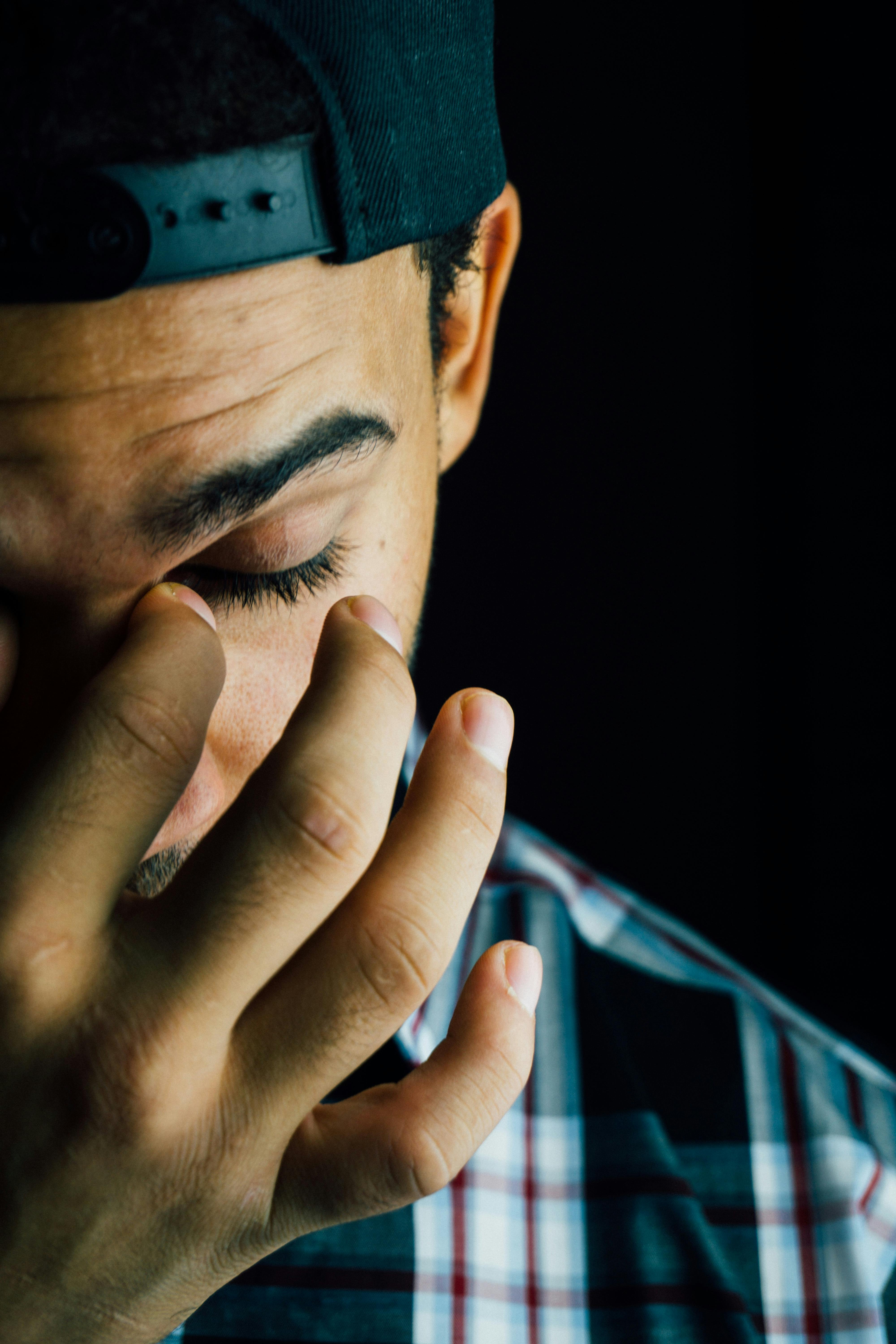 Sad boy sitting near window Stock Photo by ©belchonock 115156044