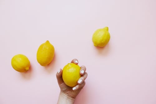 Four Yellow Lemons