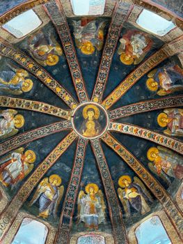 Intricate frescoes depicting Christian icons on the dome of the Chora Church in Istanbul, Turkey.