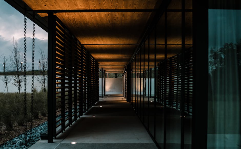 A garden path at dusk illuminated by low-voltage landscape lighting fixtures along the edge - Garden path pavers A garden path at dusk illuminated by low-voltage landscape lighting fixtures along the edge - Garden path pavers