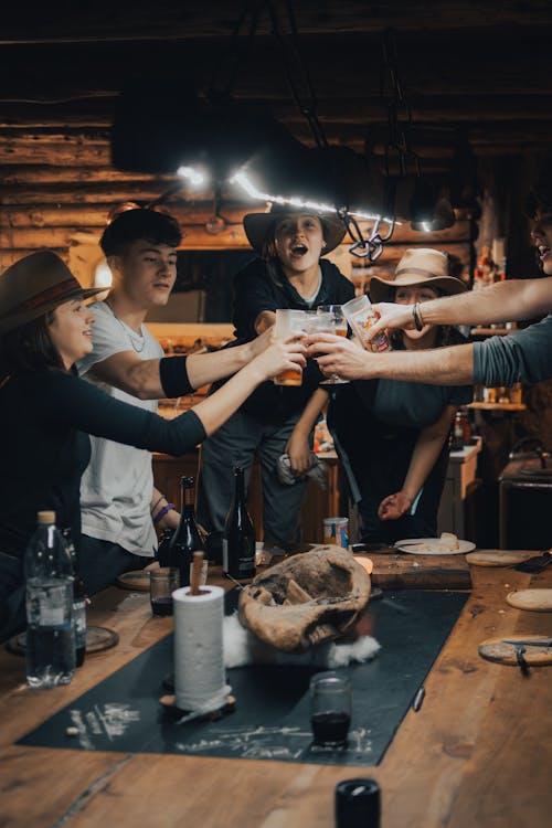 A group of people toasting at a table
