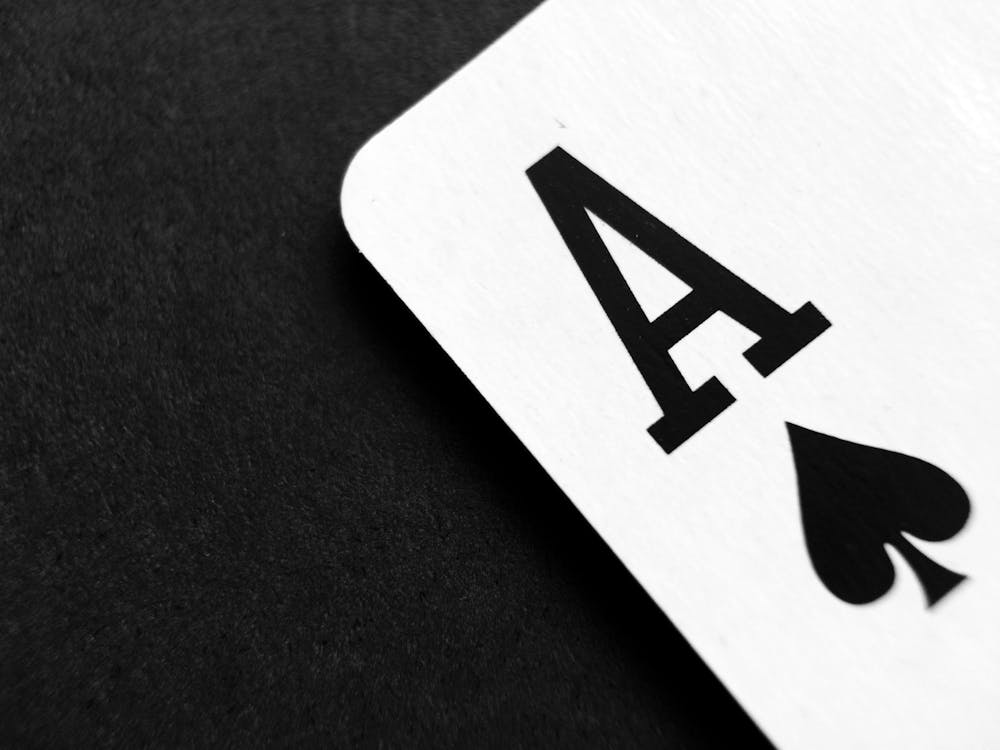Free Ace of Spade Playing Card on Grey Surface Stock Photo
