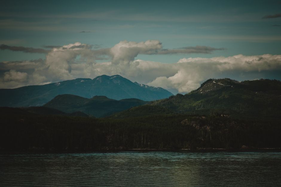 Best Adventure Kart Expedition- Ketchikan, AK Review: The Ultimate Off-Road Rainforest Adventure Review 2026 - Breathtaking view of mountains under a cloudy sky, reflecting in serene water.