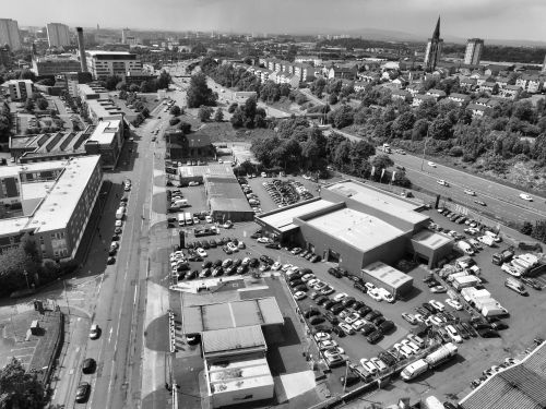 Free Black and white aerial photo of a busy industrial zone in Glasgow City, Scotland. Stock Photo