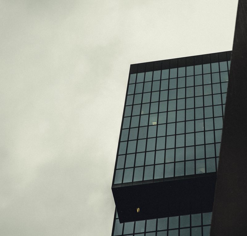 Corner of a modern office block — photo by Louis on Pexels