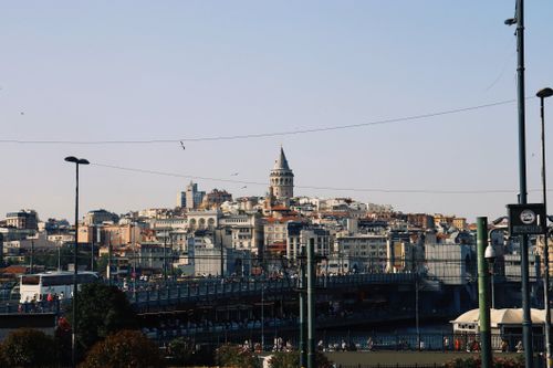 Free Capture of Galata Tower and Bridge in Istanbul under a clear blue sky. Stock Photo