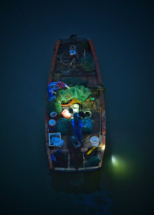 Free Top View Photo Of Boat During Evening Stock Photo