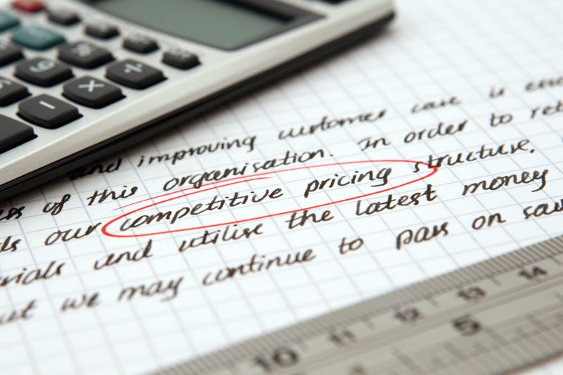 Handwritten notes on competitive AI pricing and subscription strategy