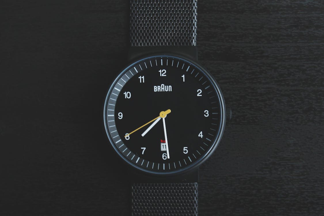 Free Round Black Braun Analog Watch Displaying 7:29 Time Stock Photo
