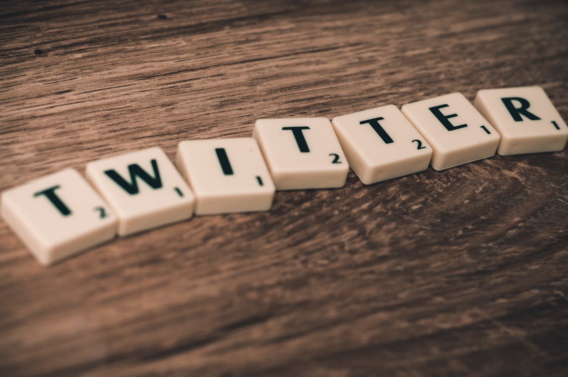 Twitter Cube on Wood Table