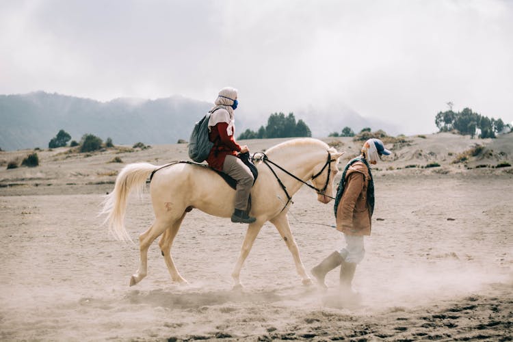 Photo Of Person Riding A Horse