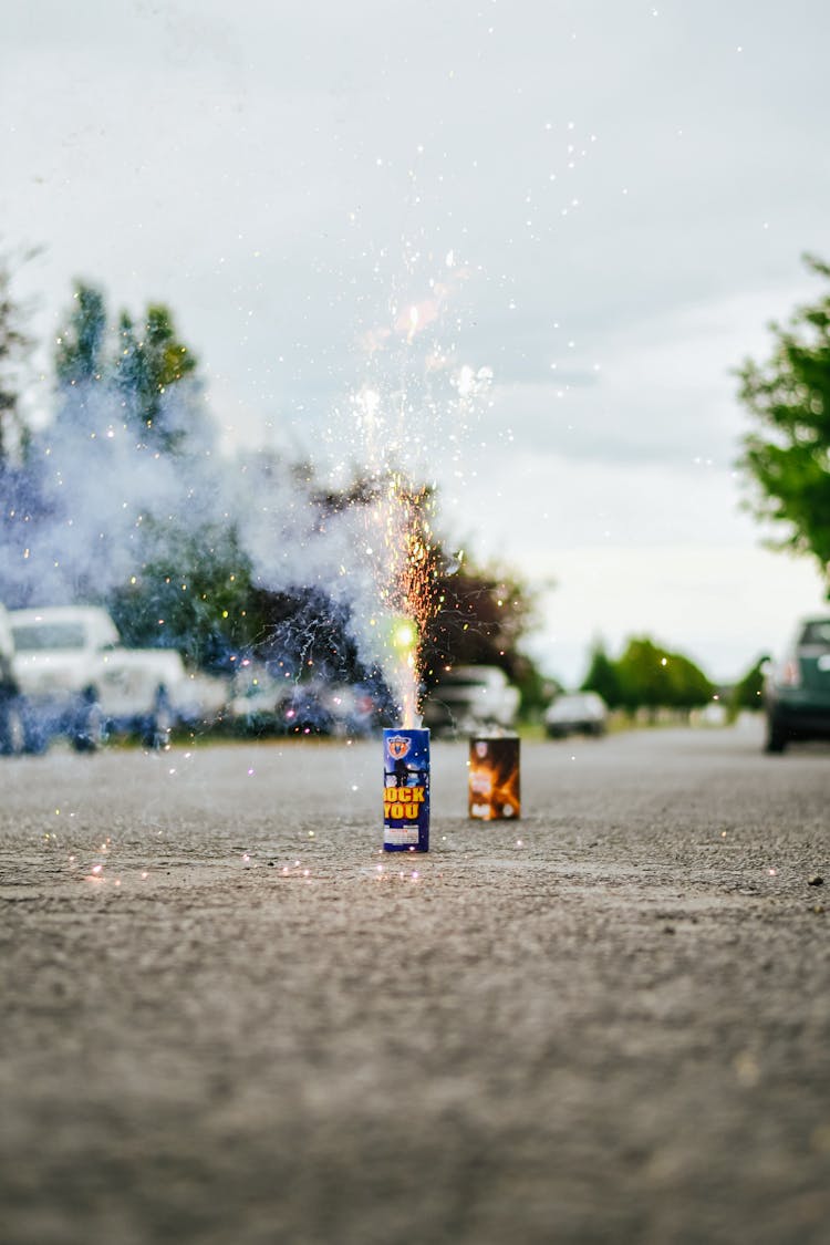 Set Off Can Of Fireworks Standing On Street