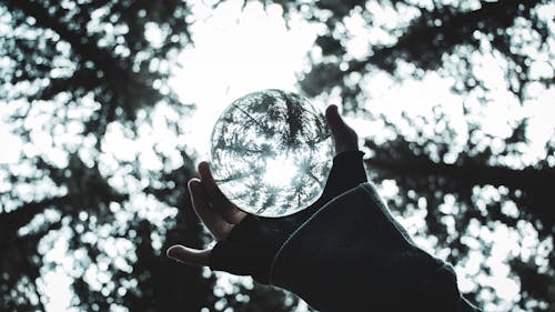 Free Close-Up Photo of Person Holding Lensball Stock Photo