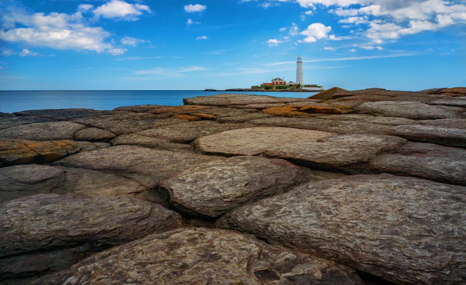 lighthouse coastal rocks