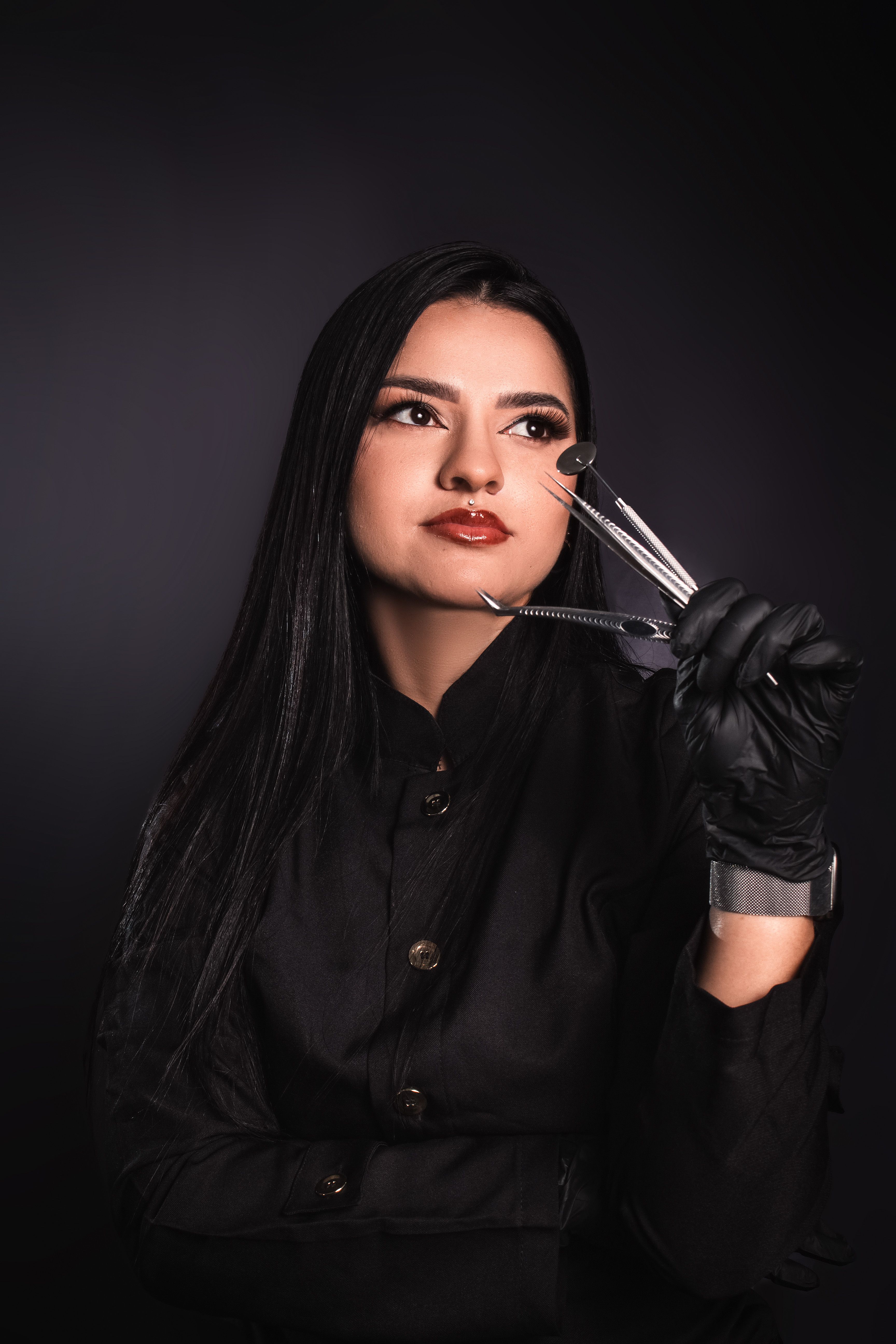 Portrait of a Young Woman Holding Steel Tools in her Hand · Free Stock ...
