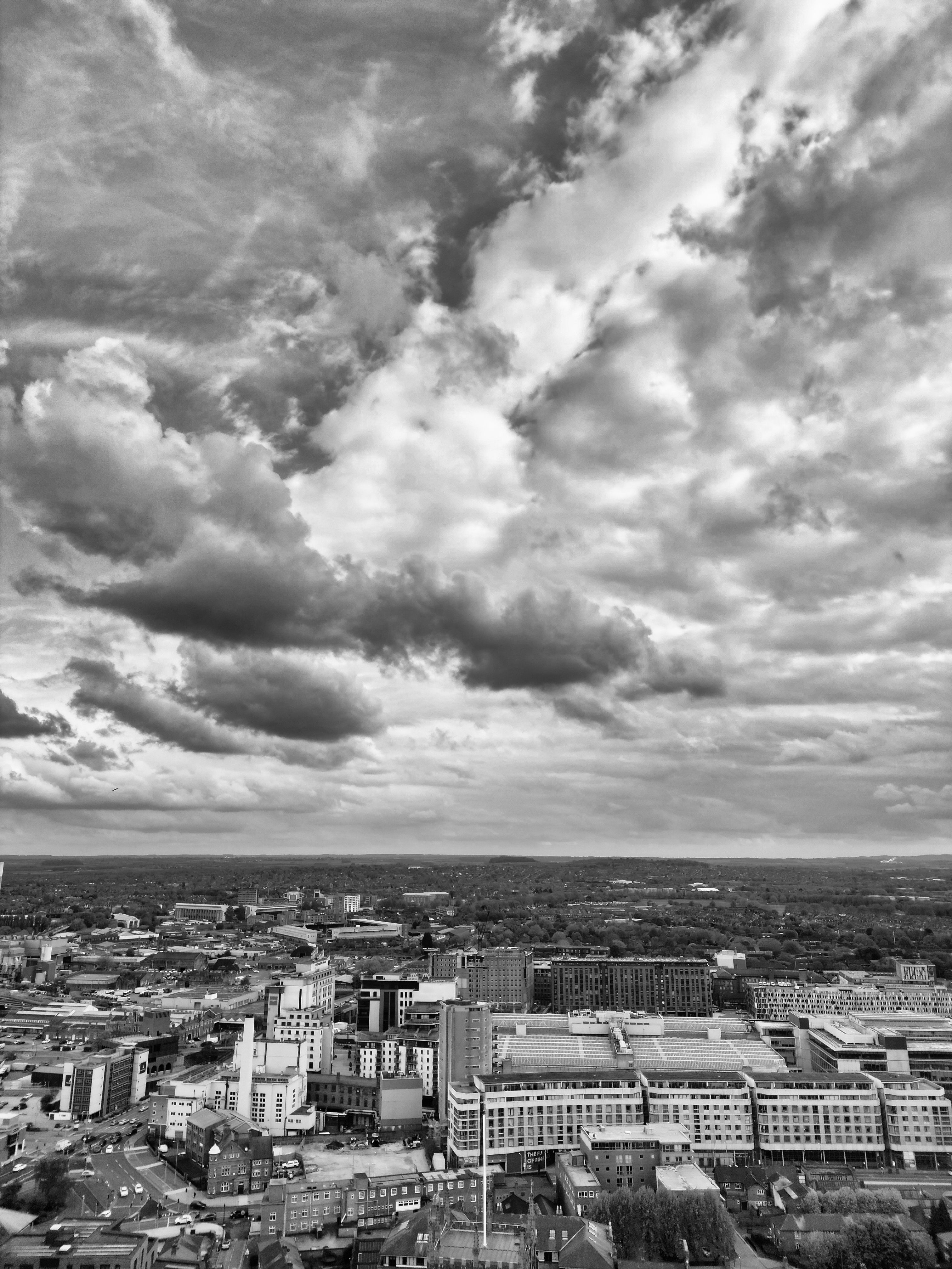 Aerial View of the City under a Cloudy Sky · Free Stock Photo