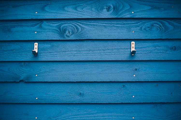 Blue Wooden Wall With Hooks