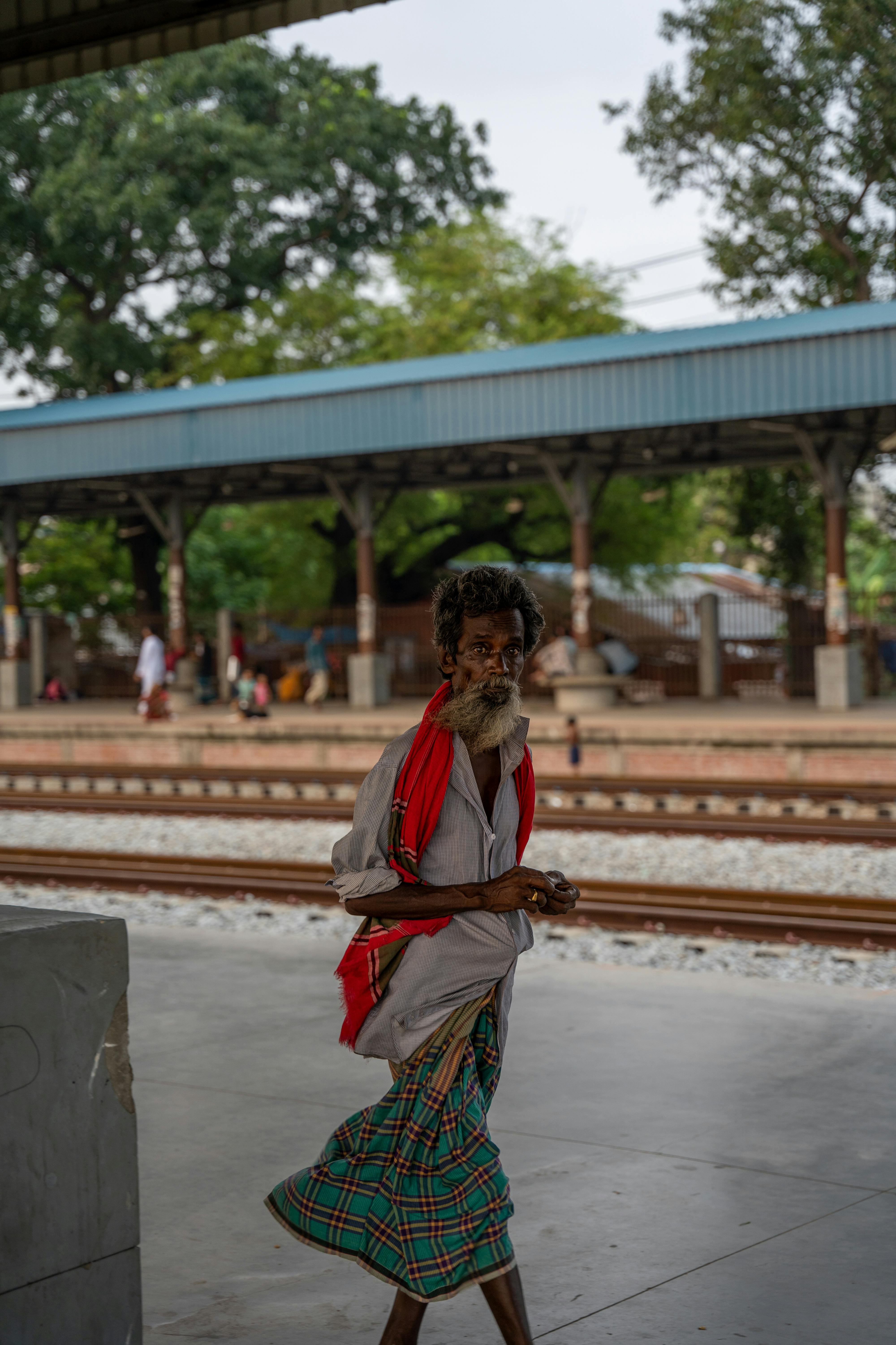 elderly man at railway station