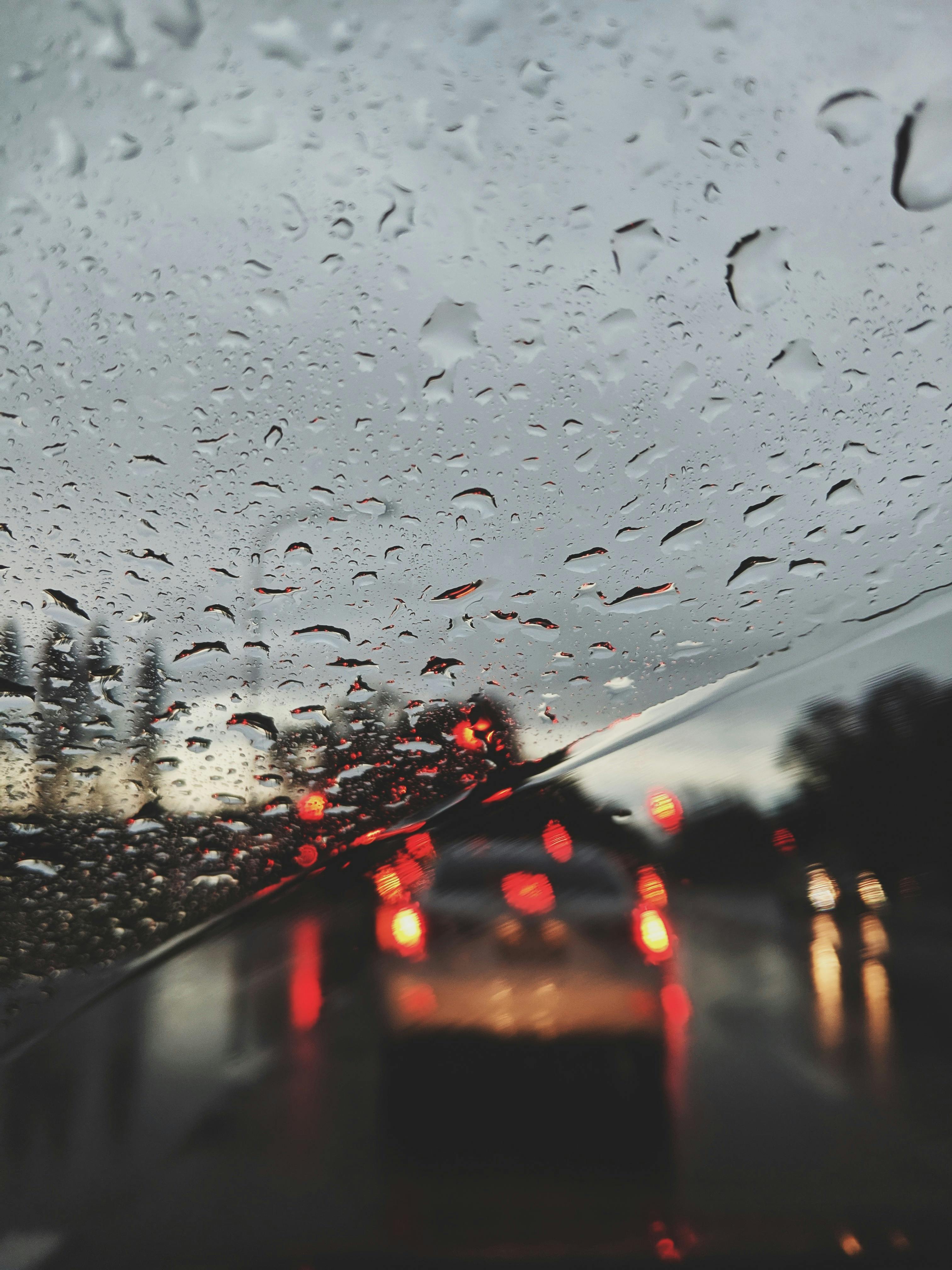 close up of raindrops on the windshield