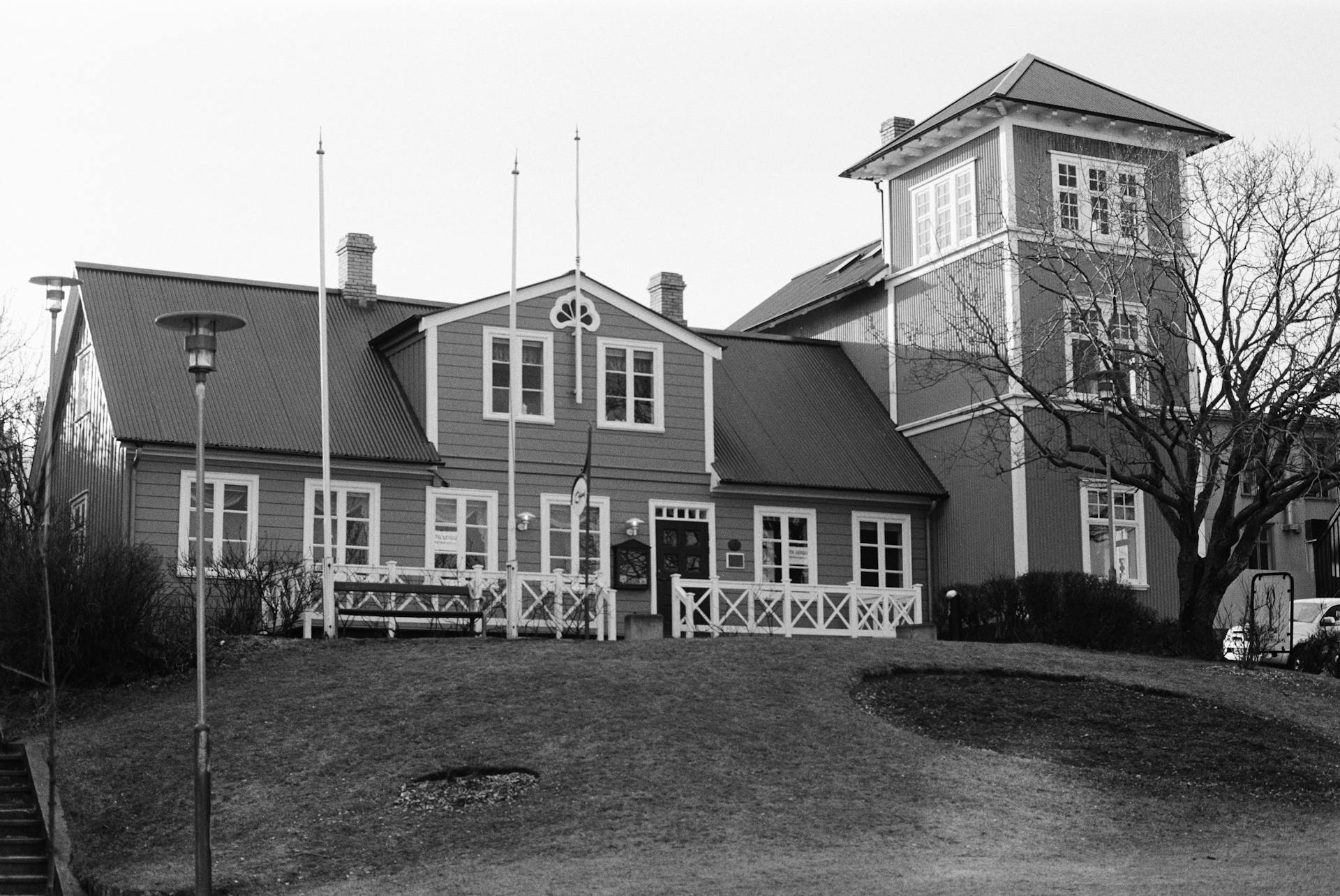 Charming historic building in Reykjavik, captured in elegant black and white.