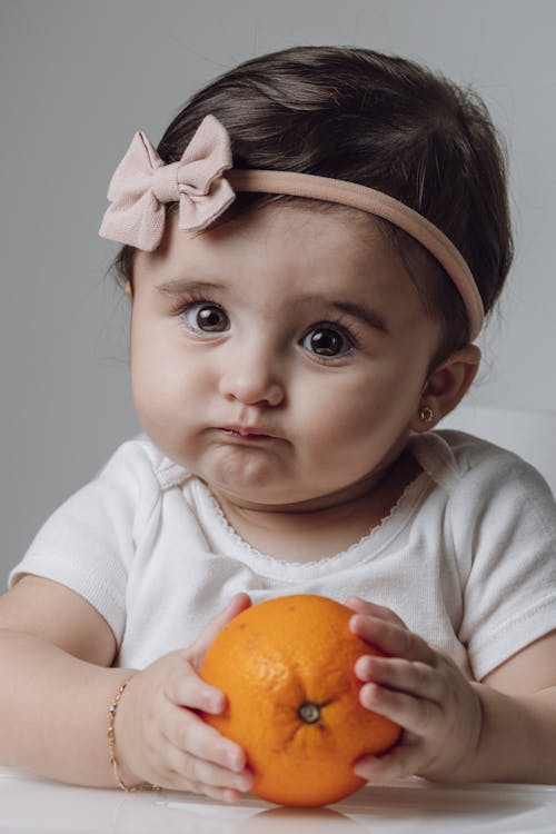 Kostnadsfri bild av apelsin, barn, bebis