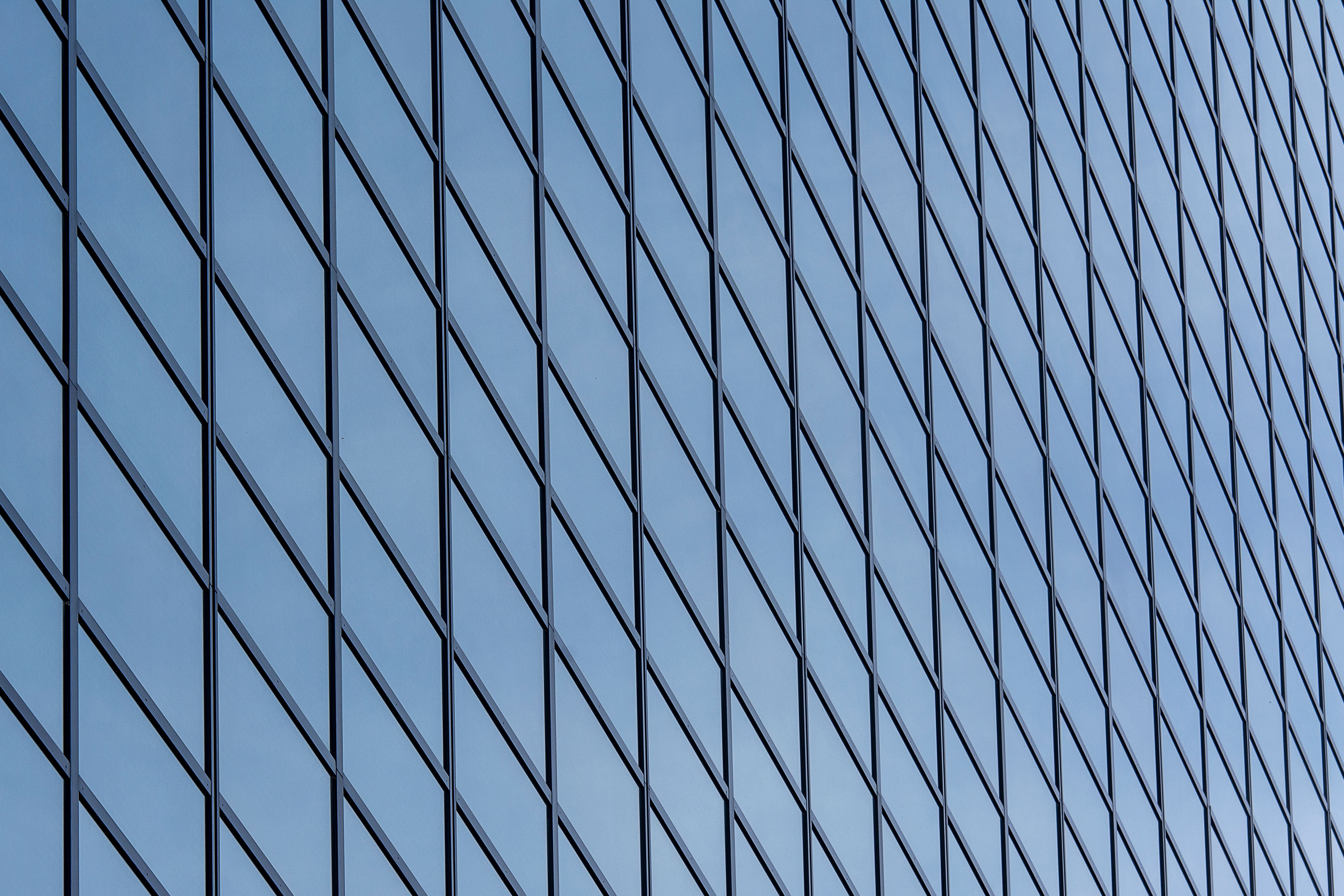 Close-up of a Glass Facade of a Modern Skyscraper · Free Stock Photo