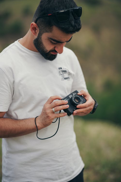 boy with a film camera