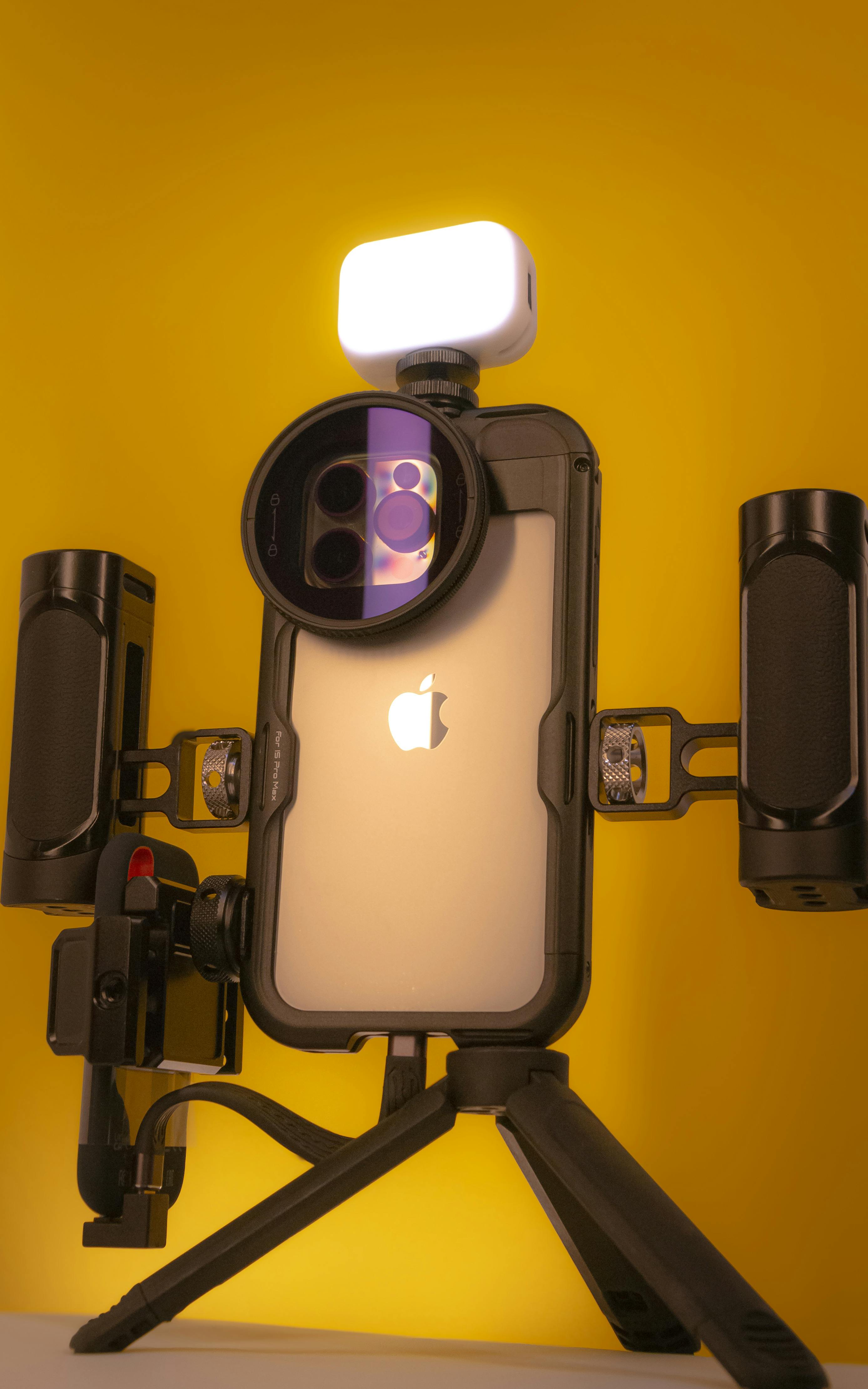 iphone with some filming accessories