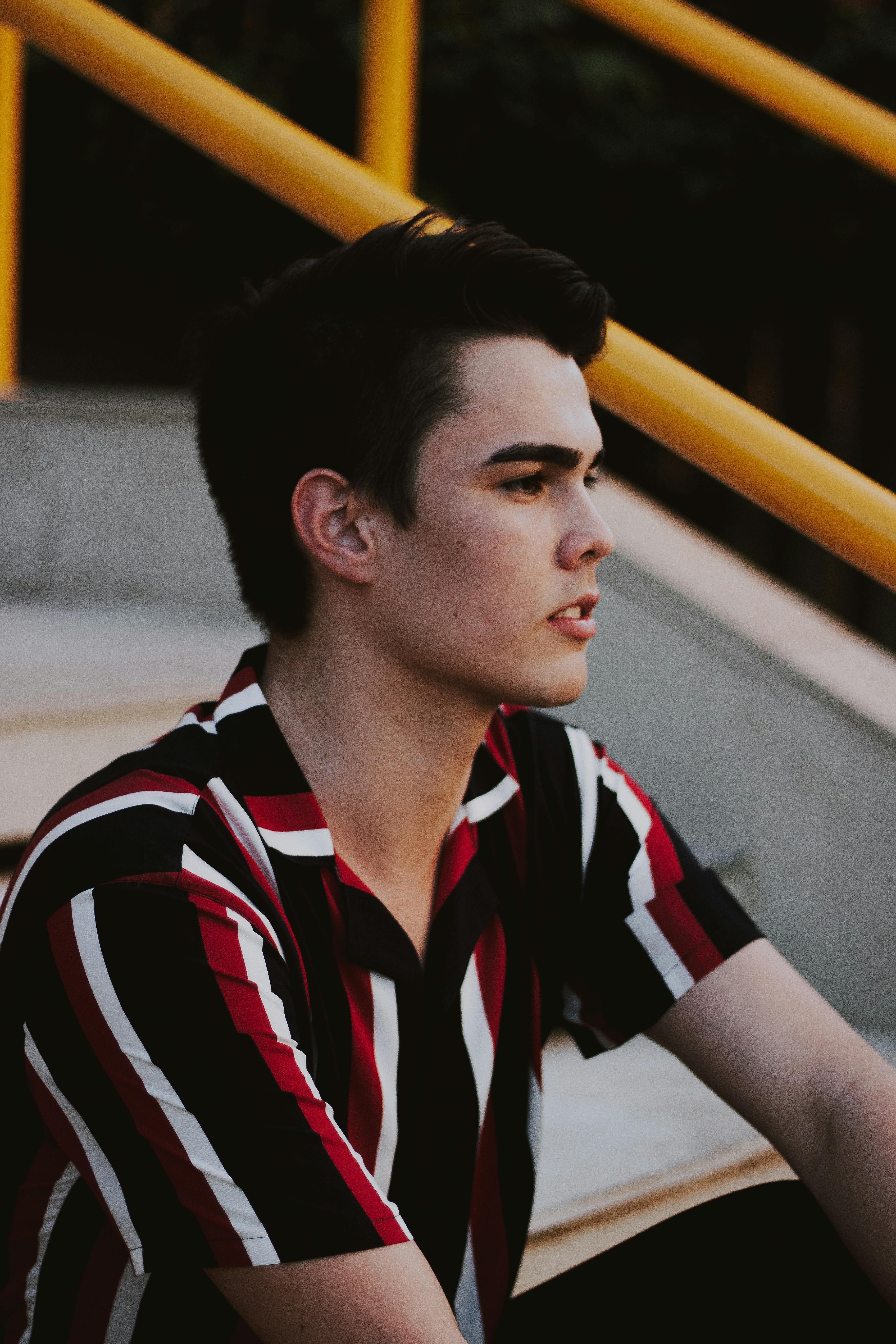 Man Sitting on Stairs · Free Stock Photo