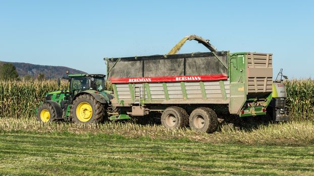 Tractor with Carriage on a Field 