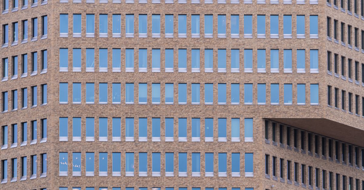 Close-up view of a modern office building facade with uniform windows in Göteborg, Sweden.