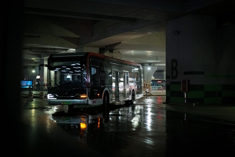 Bus At Parking Lot At Night