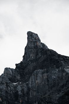 Towering rocky peak in Sixt-Fer-à-Cheval, France, showcasing nature's rugged beauty.