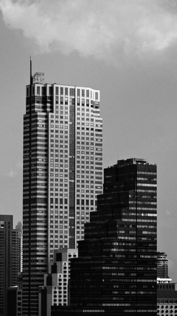 Monochrome view of Bangkok's skyscrapers showcasing urban architecture.
