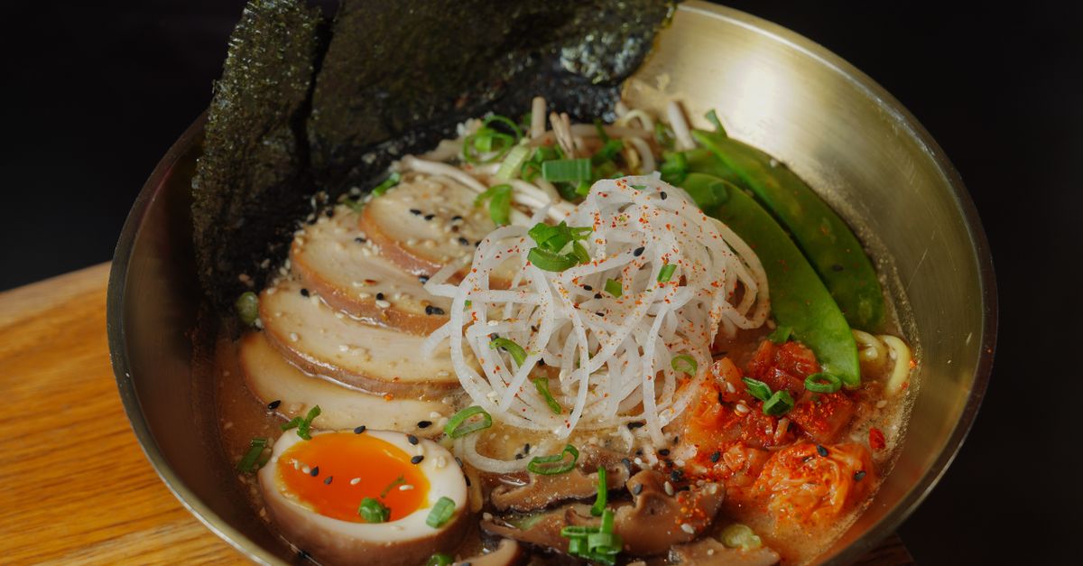 A finished ramen bowl with nori Finished ramen bowl garnished with nori seaweed sheets