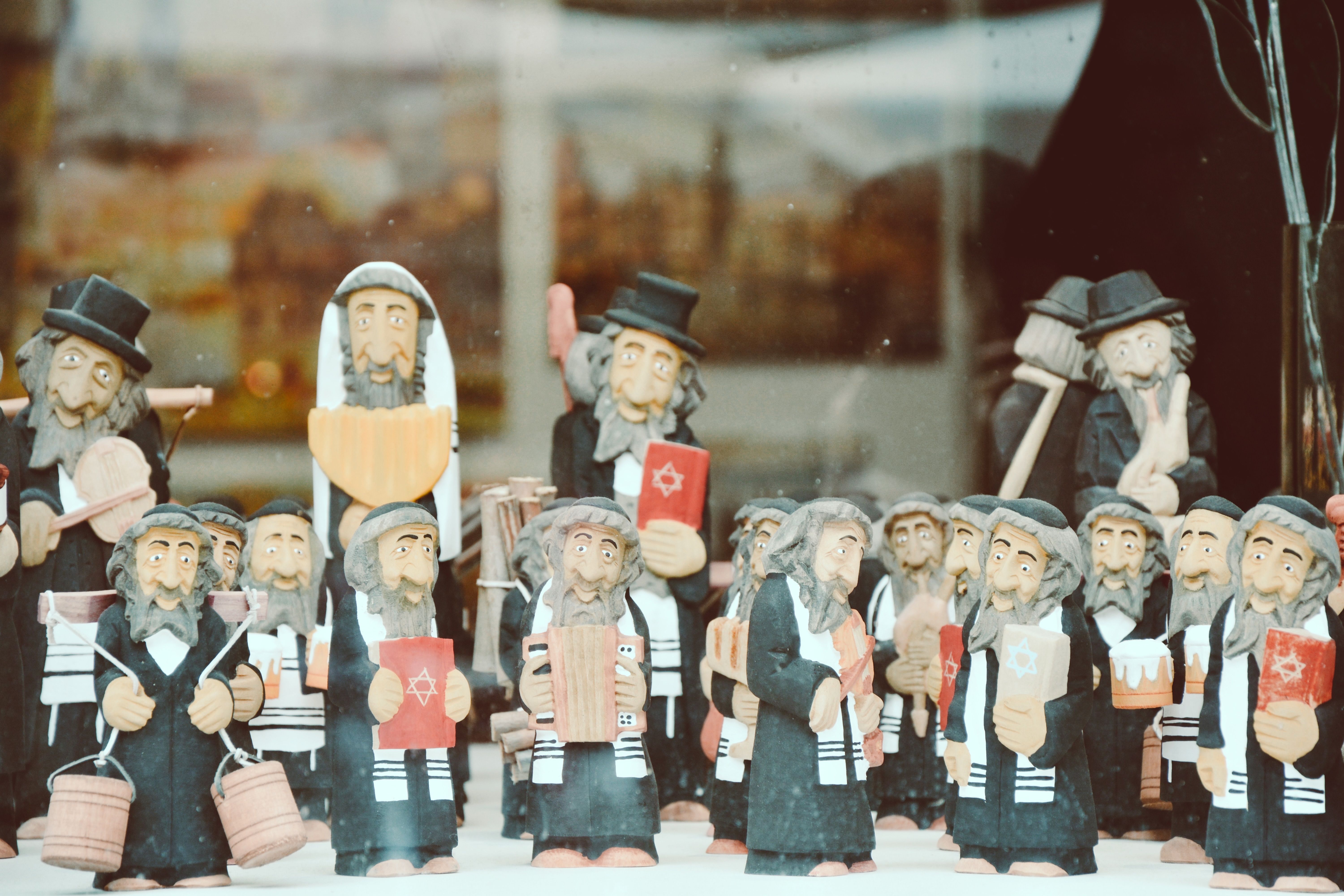 Figurines of Religious Jewish Men in a Shop Display · Free Stock Photo