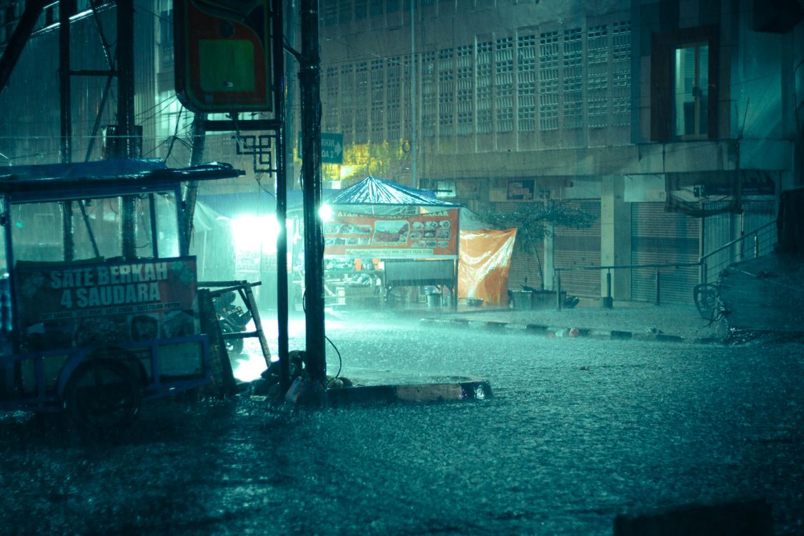 Food Heavy Rains Street Food Stall and Cart During Heavy Rain · Free Stock Photo
